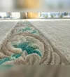 Grey and Turquoise Mosque Carpet close-up of the carpet pile and motif
