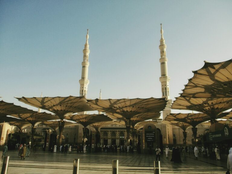 Photoreal mosque courtyard with monumental architecture and minaret